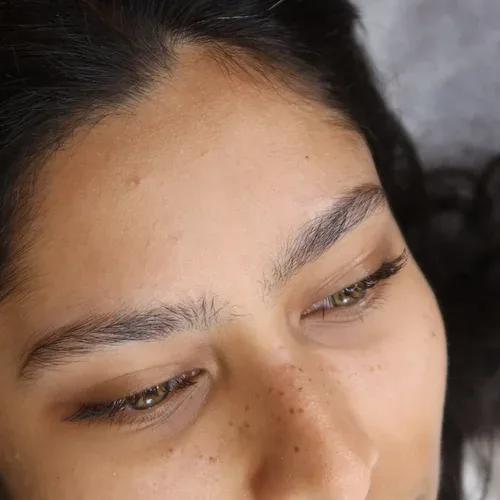 Cheek beauty spot and soft freckles